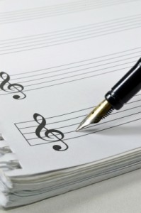 Image of pen writing music score