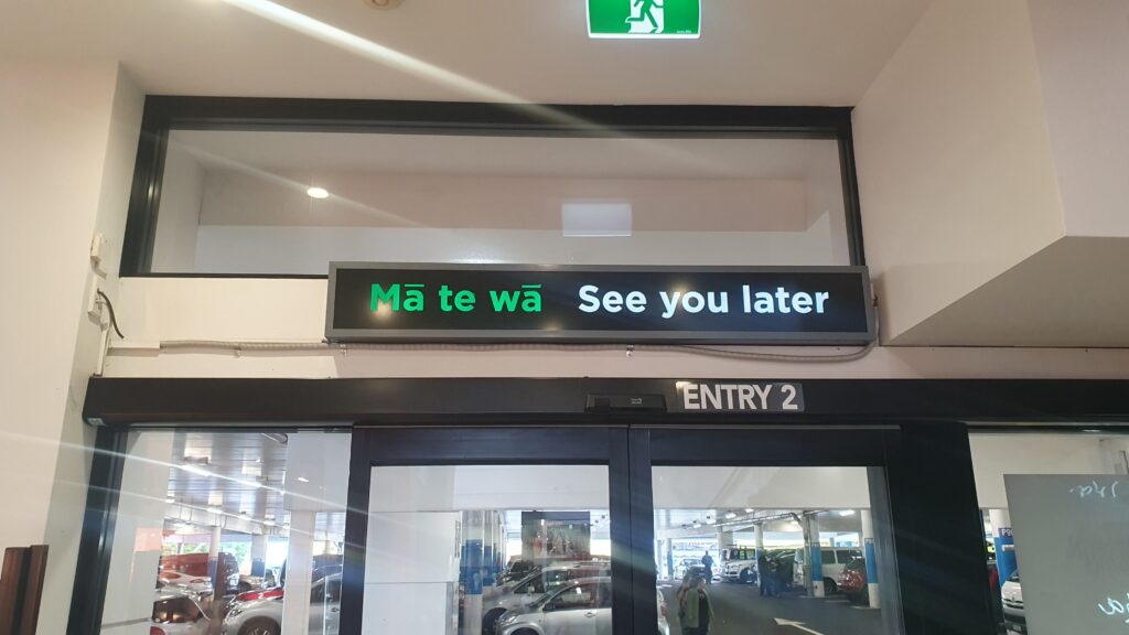 Westfield, Henderson bi-lingual exit sign reading ‘Mā te wā See you later’ 