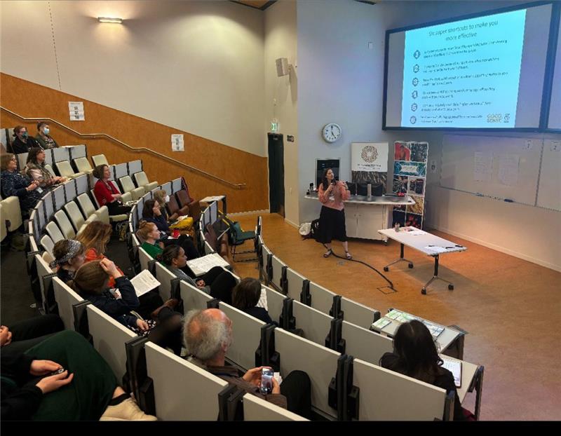 GoodSense science communications team member Laura Hikawai-Goodall standing infront of an audience running a workshop at the SCANZ conference 2023
