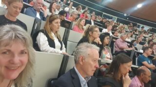 A full theatre of people at the WeALL conference 2024